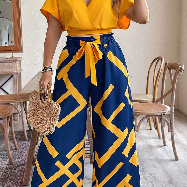GIBSIE Plus Size Pants Set Women Summer V-neck Short-sleeved Crop Top Printed Tie Front Wide Leg Trousers Vacation Two-piece Set