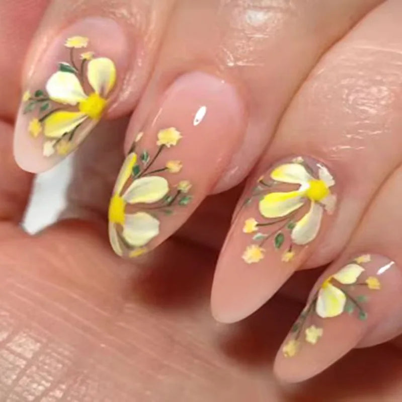 24Pcs Frosted Nude Color False Nails Press on Long Almond Round Head Nails Set with Cute Flowers Design Detachable Fake Nail Tip