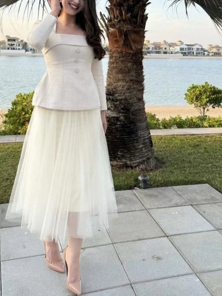 TWOTWINSTYLE Solid Two Piece Set For Women Diagonal Collar Long Sleeve Tunic Top High Waist Pleated Skirt Elegant Sets Female