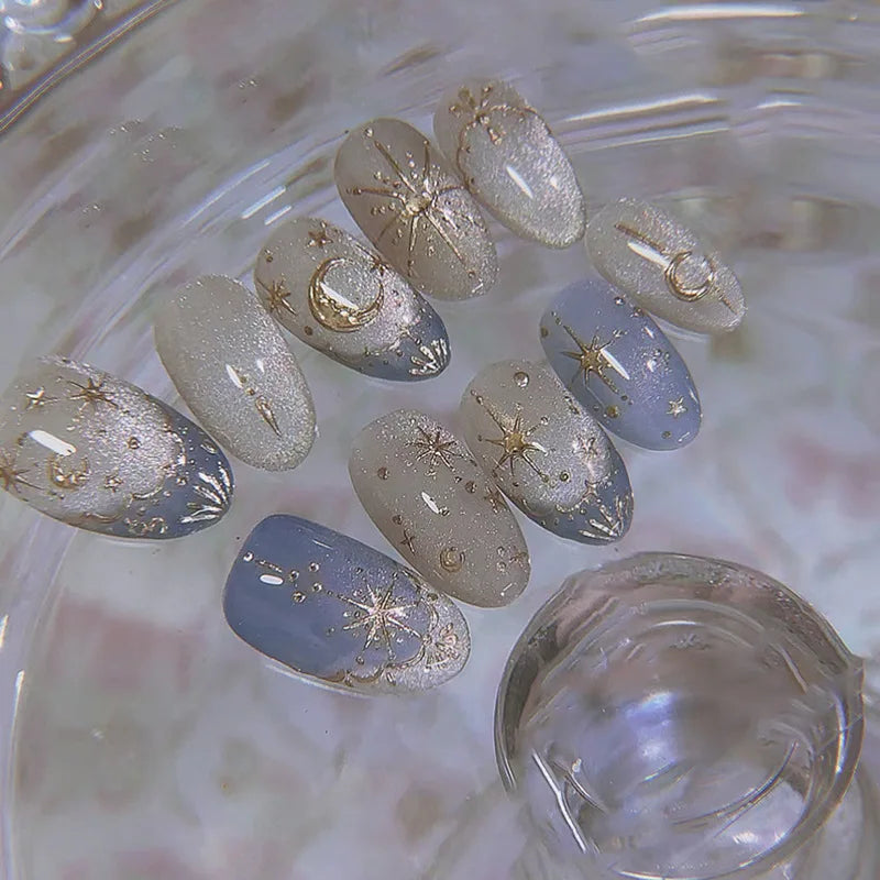24Pcs Glitter Blue French False Nails Press on Short Round Head Fake Nail with Moon Star Design Artifical Almond Manicure Tips