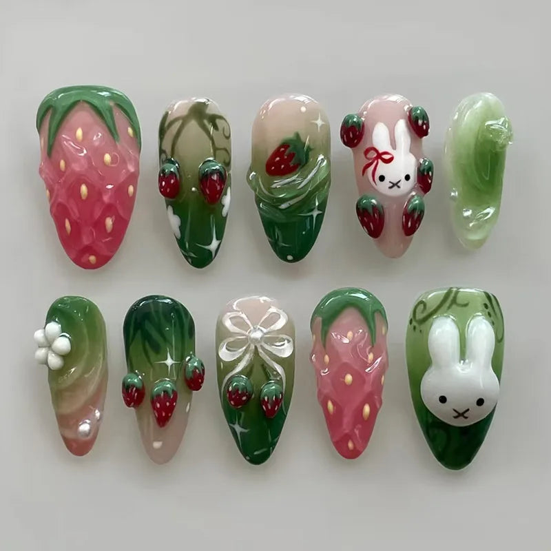 24Pcs Green Oval False Nails with Strawberry Design Wearable Mid-length Almond Press on Fake Nails Rabbit Pattern Nail Art Tip