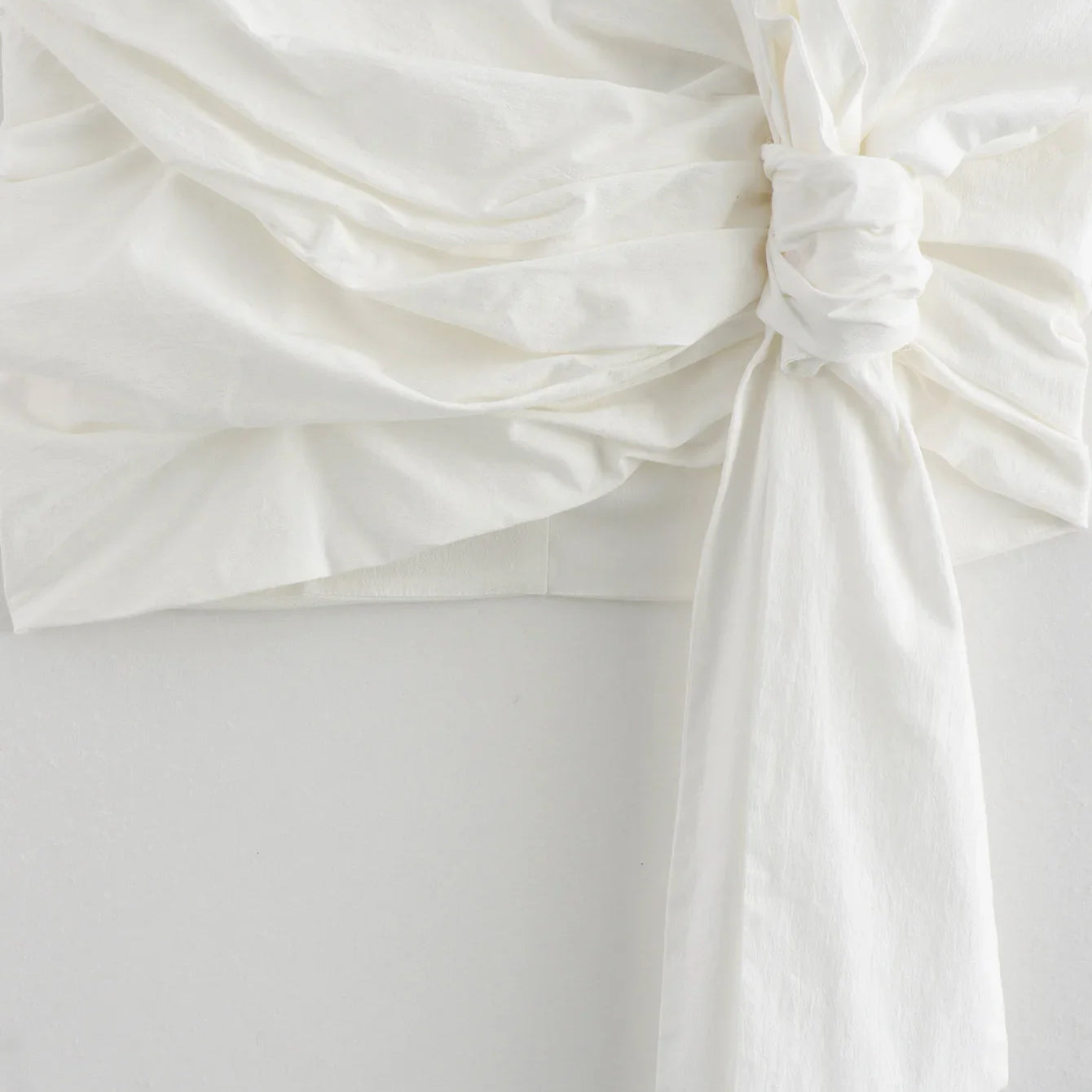 TRAFZA Elegant Woman Solid Back Zipper High Waist Short Skirts Women Summer Chic Asymmetric Bow Lace-Up Decorate Mini Skirt Y2K