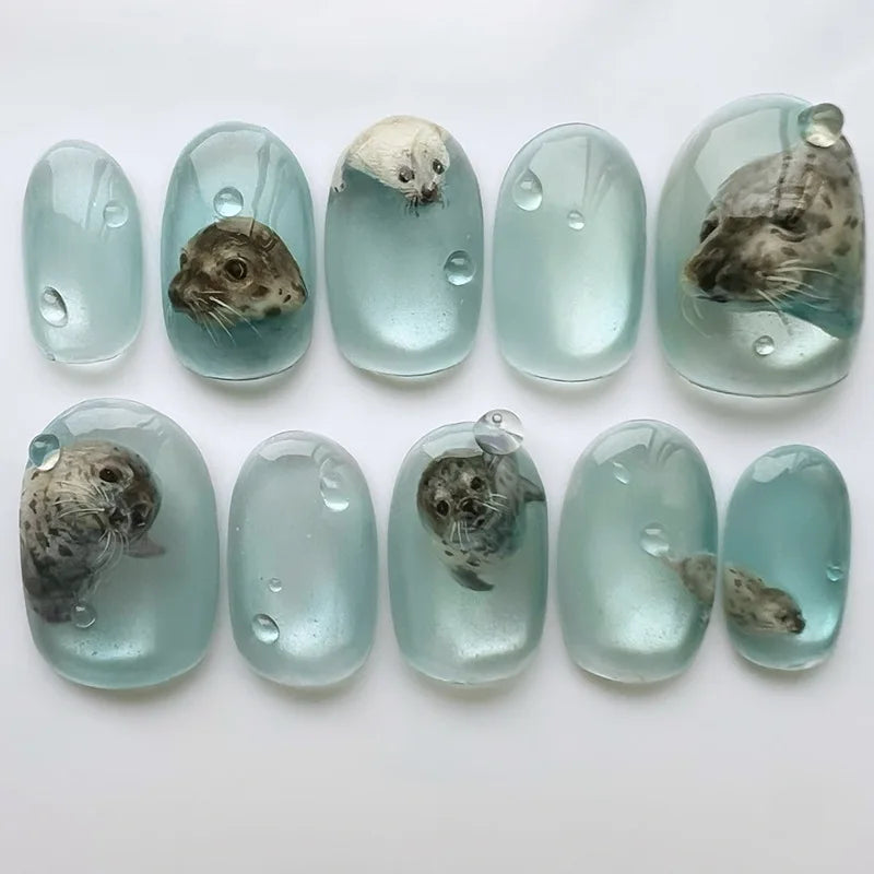 24pcs Shiny Green Cat Eye False Nails Cute Seal Print Fake Nails Tips Wearable Reusable Glossy Short Round Press on Nails