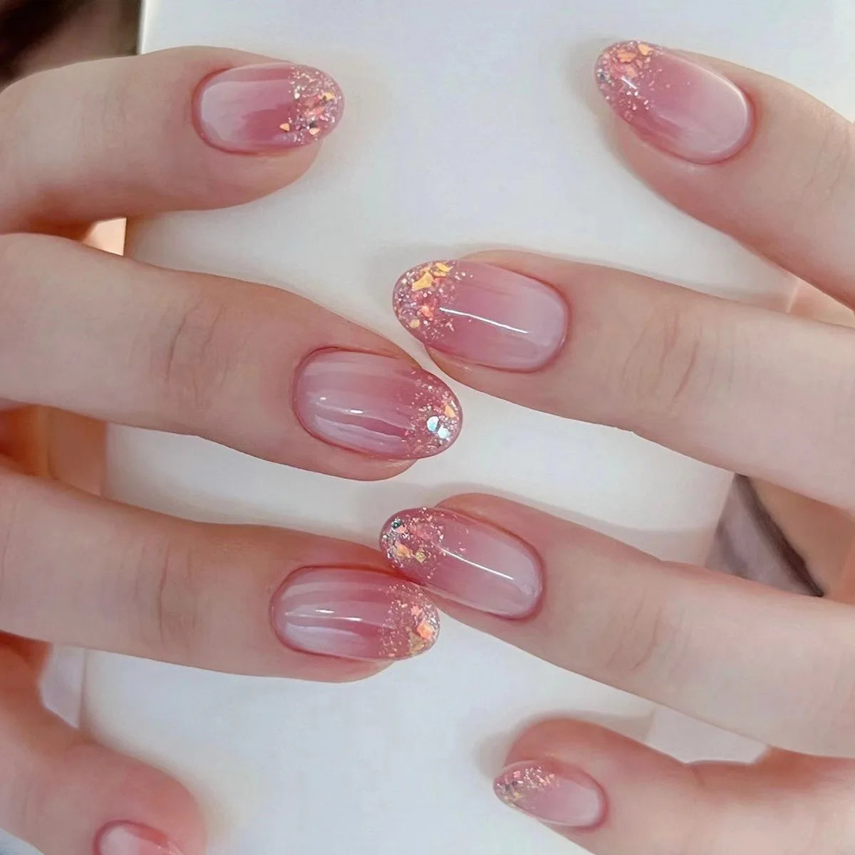 24Pcs Simple Nude Pink Press on Fake Nails with Almond Design Short Round Head False Nails Set Wearable Full Cover Nail Tips