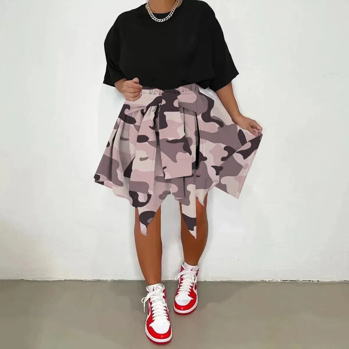 CM.YAYA Women Plaid Irregular High Waist Knee Length Skirts 2022 Summer Holiday Streetwear Sleeve Wrapped Lace Up Waist Skirt Pink Camouflage