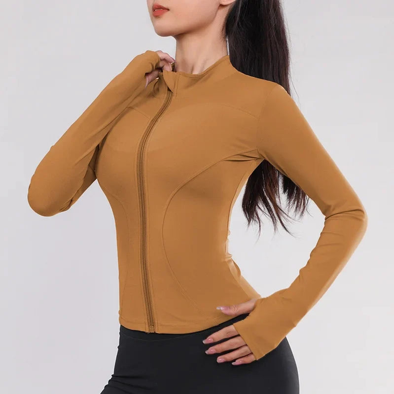 Women Gym Wear Solid Color Quick Drying Yoga Wear High Elasticity Fitness Jacket Ventilated Long Sports Shirt Women's Tracksuit pumpkin color CHINA