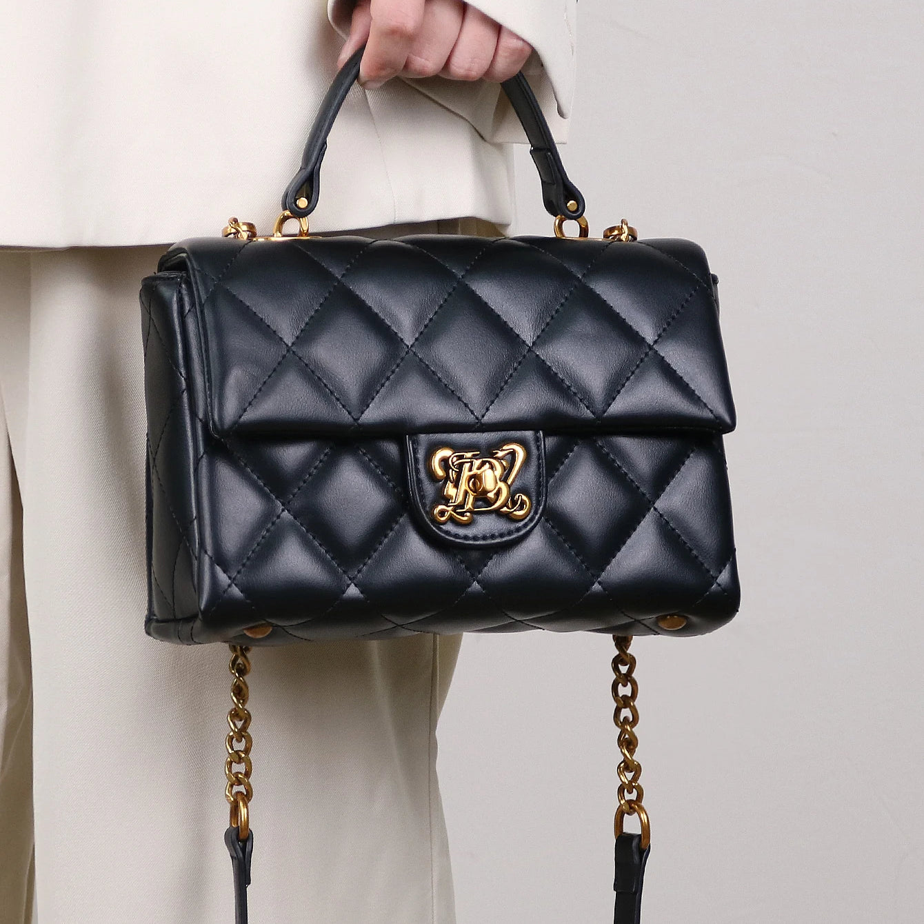 Luxury fashion handbag spring and summer 2025 new rhombic chain temperament handbag high sense niche design shoulder messenger b