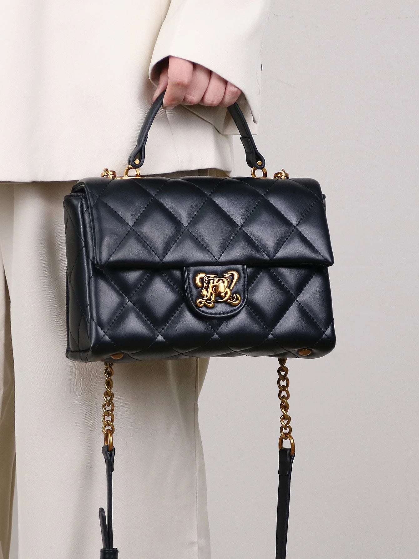 Luxury fashion handbag spring and summer 2025 new rhombic chain temperament handbag high sense niche design shoulder messenger b