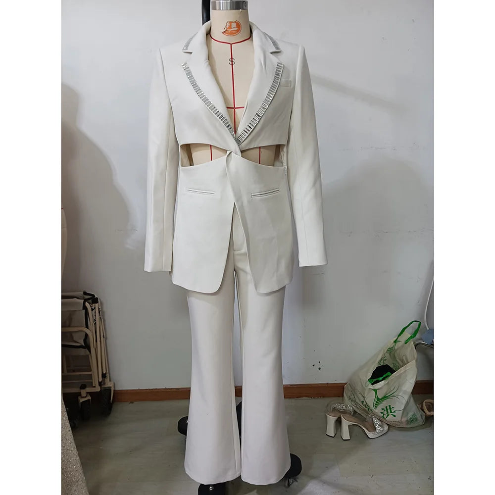 TWOTWINSTYLE Solid Hollow Out Elegant Two Piece Sets for Women Lapel Long Sleeves Spliced Hot Fix Top High Waist Pant Set Female