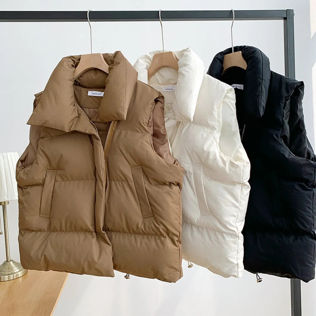 Femmes mode automne 2024 col montant élégant vers le bas manteaux chauds vêtements d'extérieur ceinture décontractée sans manches hiver femmes gilets vestes