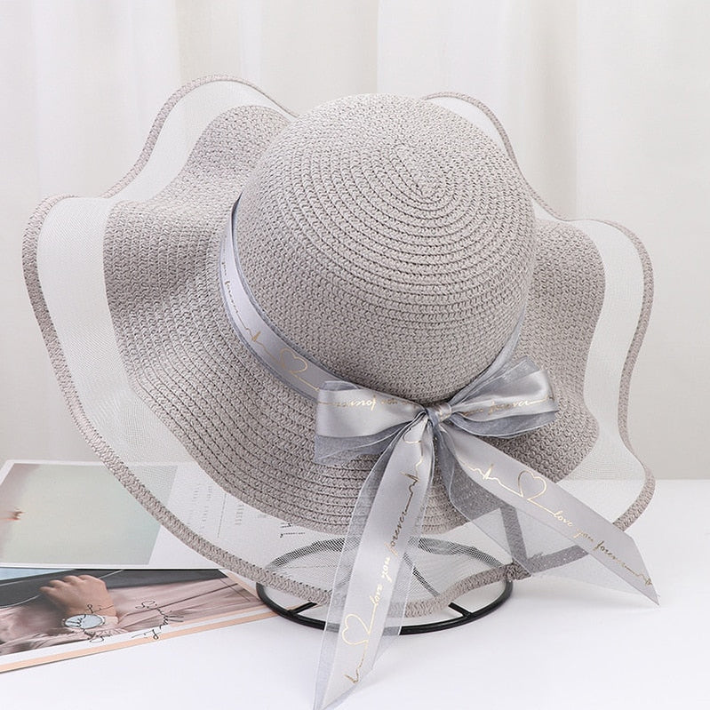 Korean Style Woman Straw Hat Bow Ribbon Large Brim Sunshade Ins Outing Fashion Beach Holiday ladies sun Hat Gray 57 cm